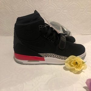 Air Jordans size 6 youth women’s size 7.5 Black with red accent elephant print